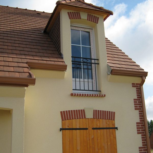 Construction d'une gerbière avec garde corps en fer forgé